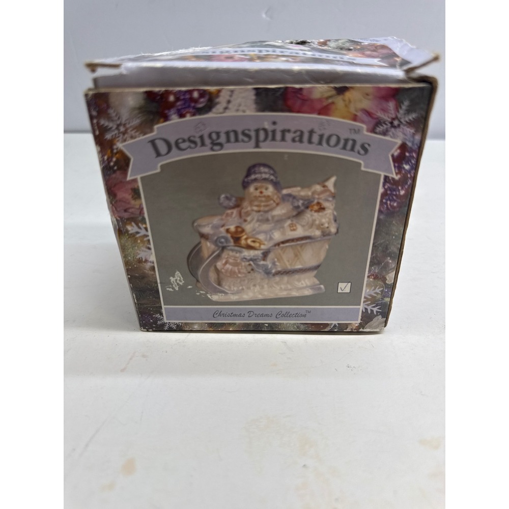Designspirations Christmas Dreams Snowman in Sleigh Figurine Pastel Gold Trim
